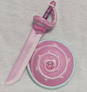 Espada e escudo Rose